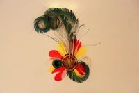 Haarclip veren rood/wit/geel